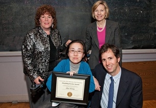 Alice Wong, center, holds up her 2010 Chancellor's Disability Service Award, honoring members of the UCSF community for their dedicated and remarkable work to advance access for and accommodation of those with disabilities. From left, fellow awardee