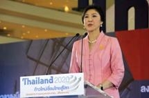 น.ส.ยิ่งลักษณ์ ชินวัตร นายกรัฐมนตรี ขึ้นกล่าวเปิดงาน นิทรรศการ “Thailand 2020 ก้าวใหม่ เชื่อมไทยสู่โลก”