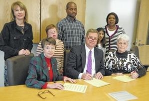 A proclamation! A Proclamation! The following gathered for the signing of a proclamation declaring March as Disability Awareness Month in Fairfield County. Back row is Laura Collins, Charman Glenn, John Mickle, Annie Smith, Shirley Kennedy, director
