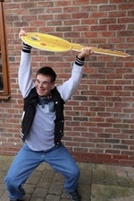 2) Picture of James Wilkinson with a giant key outside new home (C) Golden Lane
