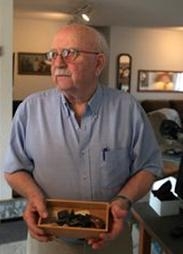 Quentin DeVore, a legally blind Army veteran from Newton, Iowa photographed in March 2013, is a gun enthusiast and collector. Despite his vision impairment, DeVore holds a permit to carry a firearm, and says he is well within his legal rights to do s