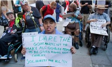 A disability protest outside the Department of Work and Pensions, London. Photograph: Graham Turner for the Guardian