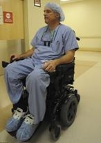 Paging Doctor Rummel: Dr. Ted Rummel is a an orthopedic surgeon in Missouri and performs his operations on joints from a wheelchair