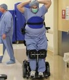 The inspirational doctor paralyzed from the waist who can still perform surgeries thanks to remarkable stand-up wheelchair