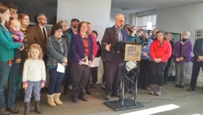 David Cowing of Woolwich, who has an adult family member with intellectual disabilities, speaks against new rules proposed by the Department of Health and Human Services in Augusta on Tuesday. Buy Photo