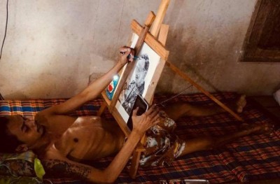 เสียสละให้เมียมีแฟนใหม่ หนุ่มอัมพาตวาดรูปเลี้ยงชีพ