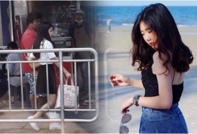 น.ส.สโรชา บุรีสิริรัตน์ หรือพลอย อายุ 21 ปี พาคนตาบอดข้ามถนน