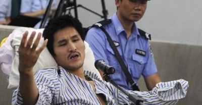 นาย จี้ จงซิง วัย 34 ปี ใช้ชีวิตบนเก้าอี้รถเข็น ถูกตั้งข้อหามีพฤติกรรมเป็นอันตรายต่อความปลอดภัยสาธารณะ