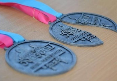เหรียญจากงานวิ่งด้วยกันมินิมาราธอน “RUN2GETHER Mini – Marathon”