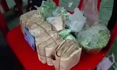 เงินสดจากการเข้าสอบสวน ชายชราพิการขอทานงานวัด